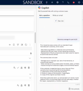Screenshot of a Copilot AI interface in a Dynamics 365 Sandbox environment. The right panel shows a Copilot-generated response to a customer query about warranty coverage for part AJ123. The response outlines what the 3-year manufacturer’s warranty covers and does not cover, along with steps for filing a warranty claim. The left panel displays email or chat drafting tools with formatting and file attachment options.
